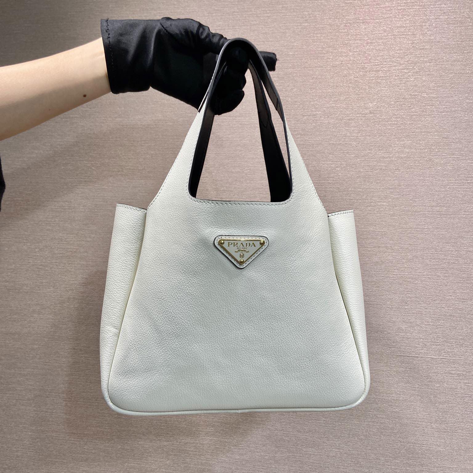 Pra*a bucket bags